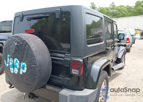 2015 Jeep Wrangler Unlimited Sahara from USA, damaged, VIN 1C4HJWEG3FL661568